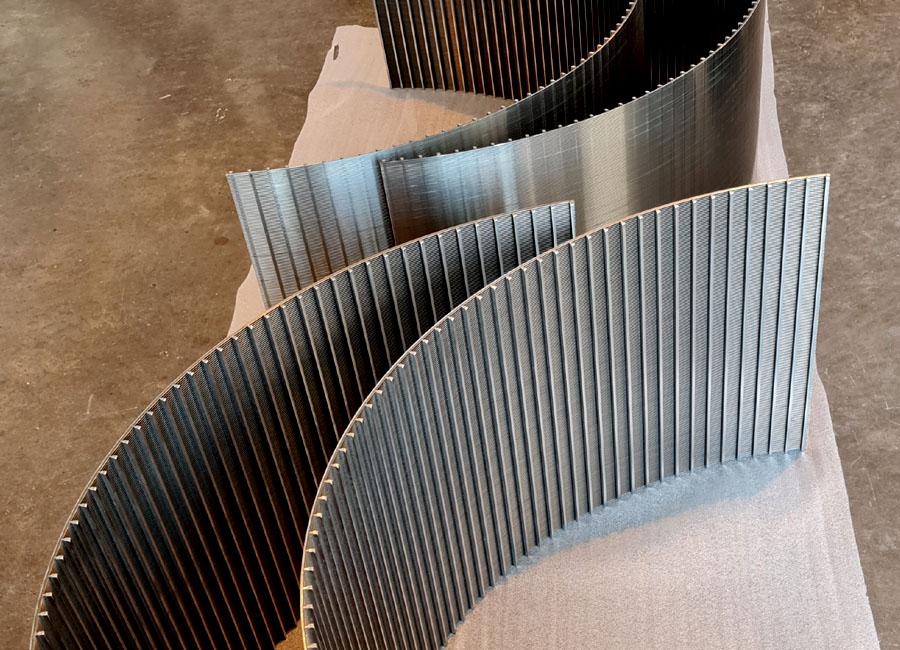 Wedge wire screens are made from V-shaped wires that are welded onto support rods, creating a continuous and uniform slot gap
